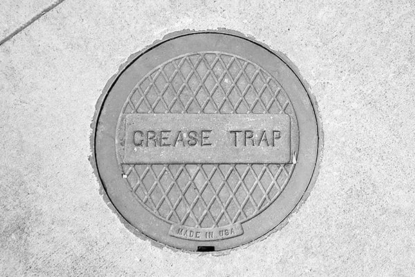 local regulations may dictate the frequency and process for grease trap pumping in commercial kitchens to prevent environmental contamination